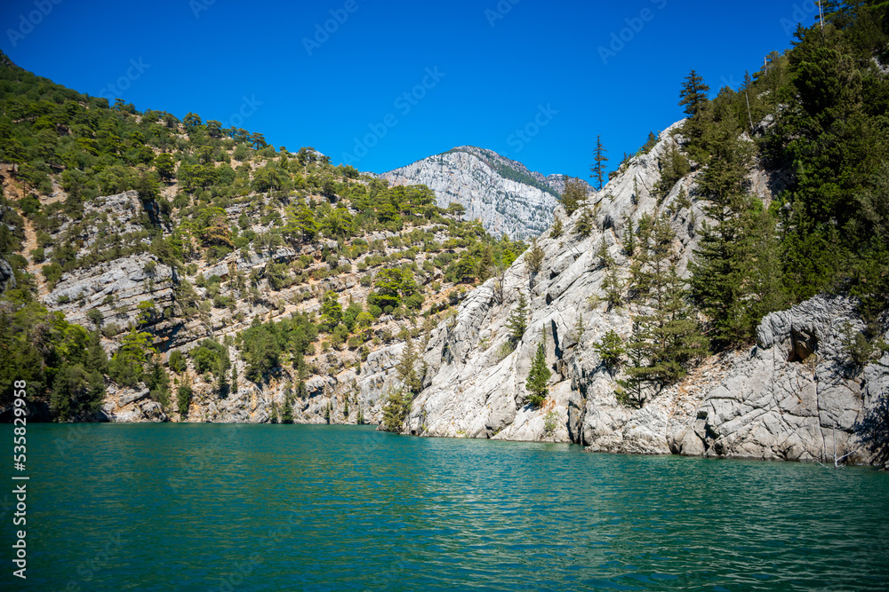 Mountain Lake. Emerald water reservoir behind the dam Oymapinar. Green Canyon in Manavgat region, Turkey. Mountain Lake. Emerald water reservoir behind the dam Oymapinar. Green Canyon in Manavgat region, Turkey.