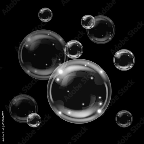 Transparent bubbles on dark background