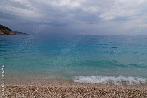 Fototapeta Naklejka Na Ścianę i Meble -  Dark stormy dramatic sky over Ionian sea. Myrtos Beach, Cephalonia island, Greece, Europe