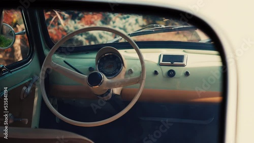 Tracking shot with the interior of an reconditioned old Fiat 500 photo
