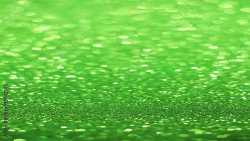 Vertical Green glitter background with in focus and out of focus area