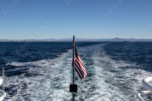 View of wake from the taffrail of a whale watching vessel in the San Diego Harbor photo