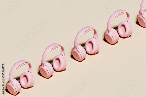 3d illustration of pink music headphones on yellow background
