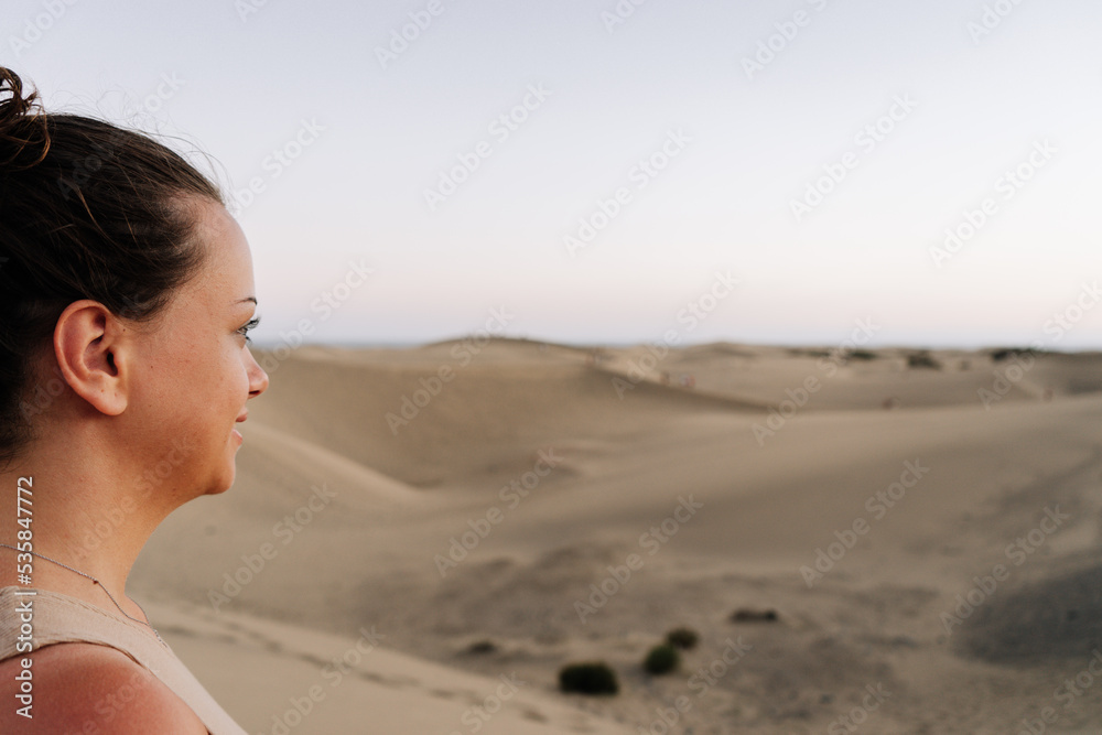 Tourist looking the Maspalomas desert Tourist looking the Maspalomas desert