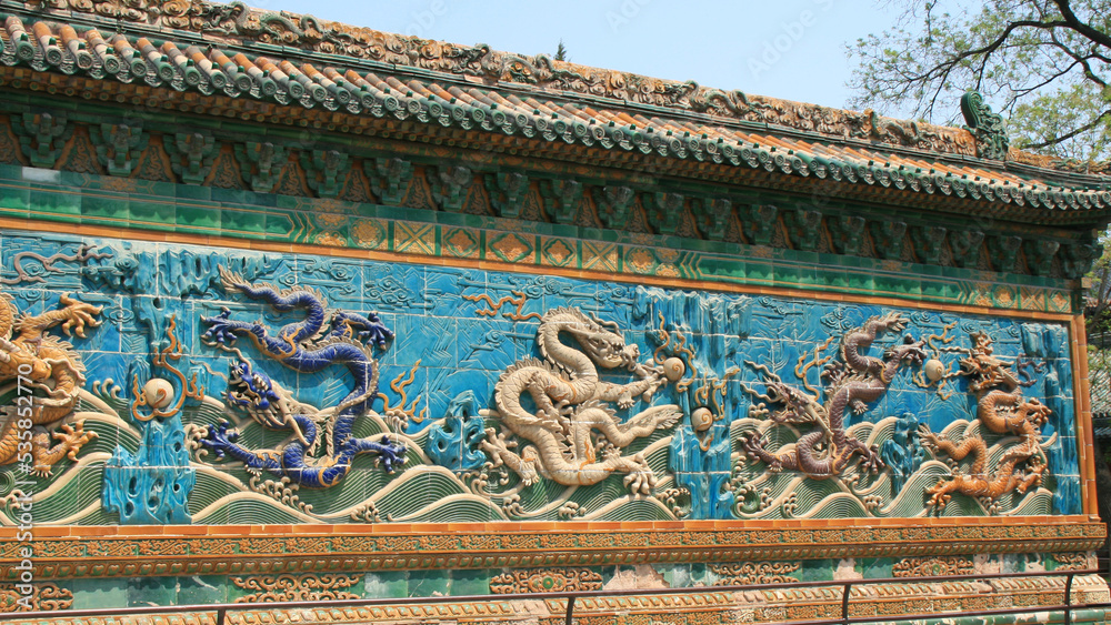 nine dragons wall at beihai park in beijing (china)