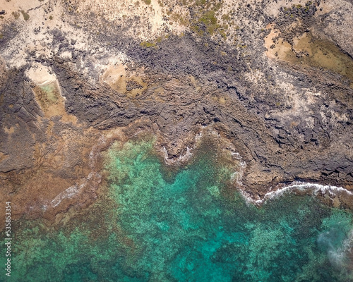 rocks and ocean from above