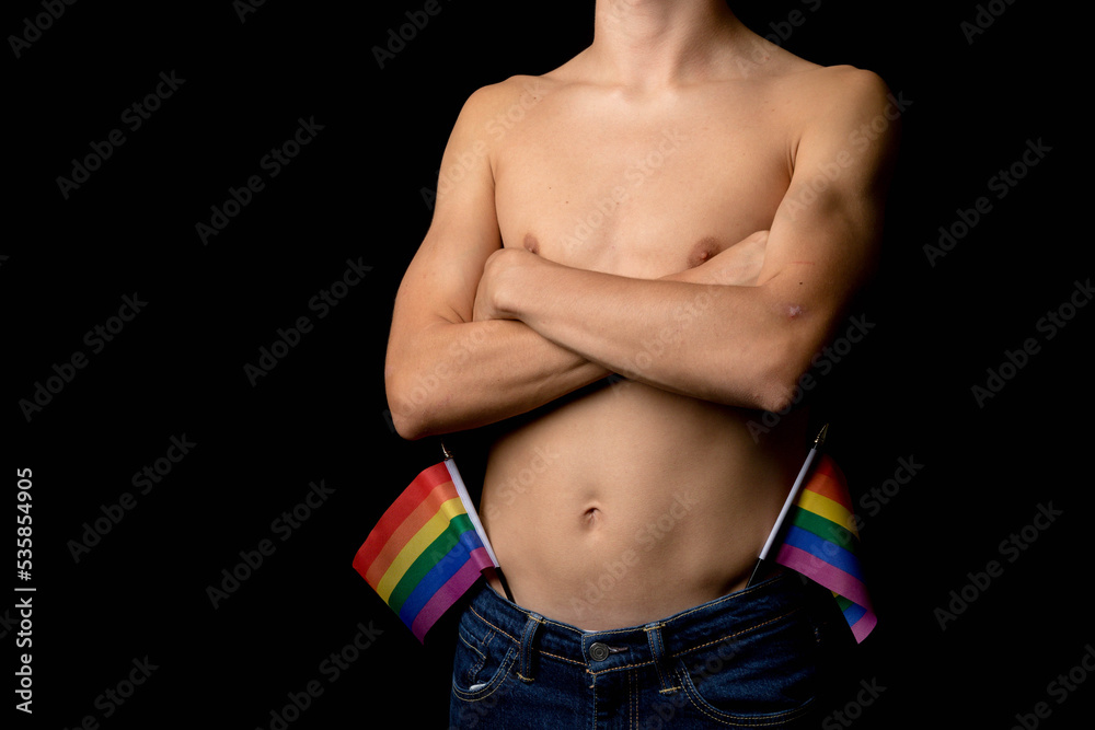 A Shirtless 19 Year Old Teenage Boy with Pride Flags A Shirtless 19 Year Old Teenage Boy with Pride Flags