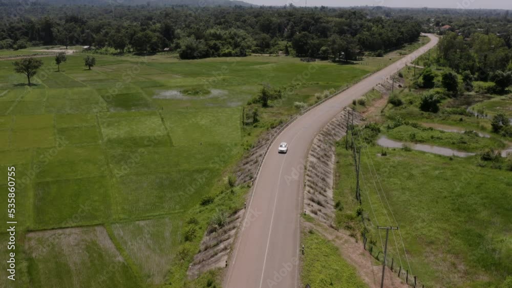 aerial view electric car driving on country road. , landscape with a road, landscape with a road, road in the countryside aerial view electric car driving on country road. , landscape with a road, landscape with a road, road in the countryside