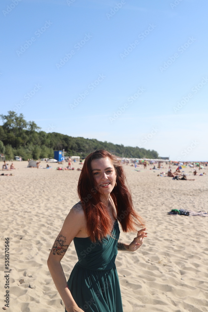 beautiful girl in a dress on the beach beautiful girl in a dress on the beach
