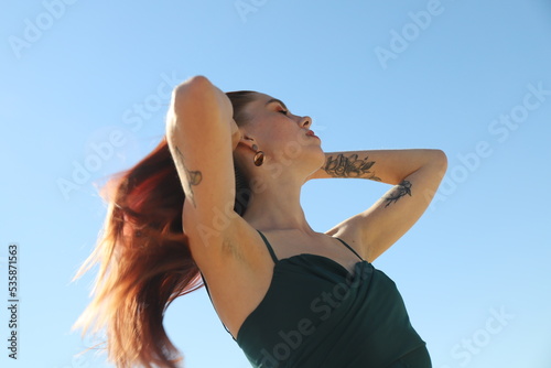 beautiful girl in a dress on the beach