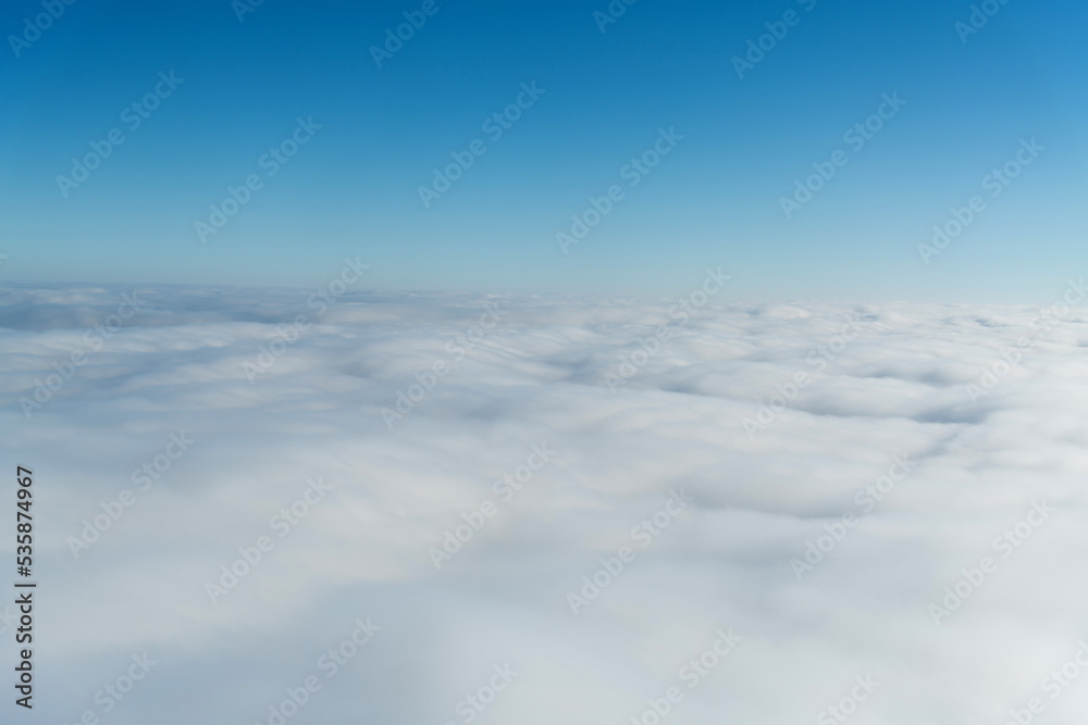 Fluffy white clouds from above Fluffy white clouds from above