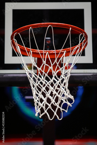 Shallow depth of field (selective focus) details with a basketball panel and net before an official game. © MoiraM