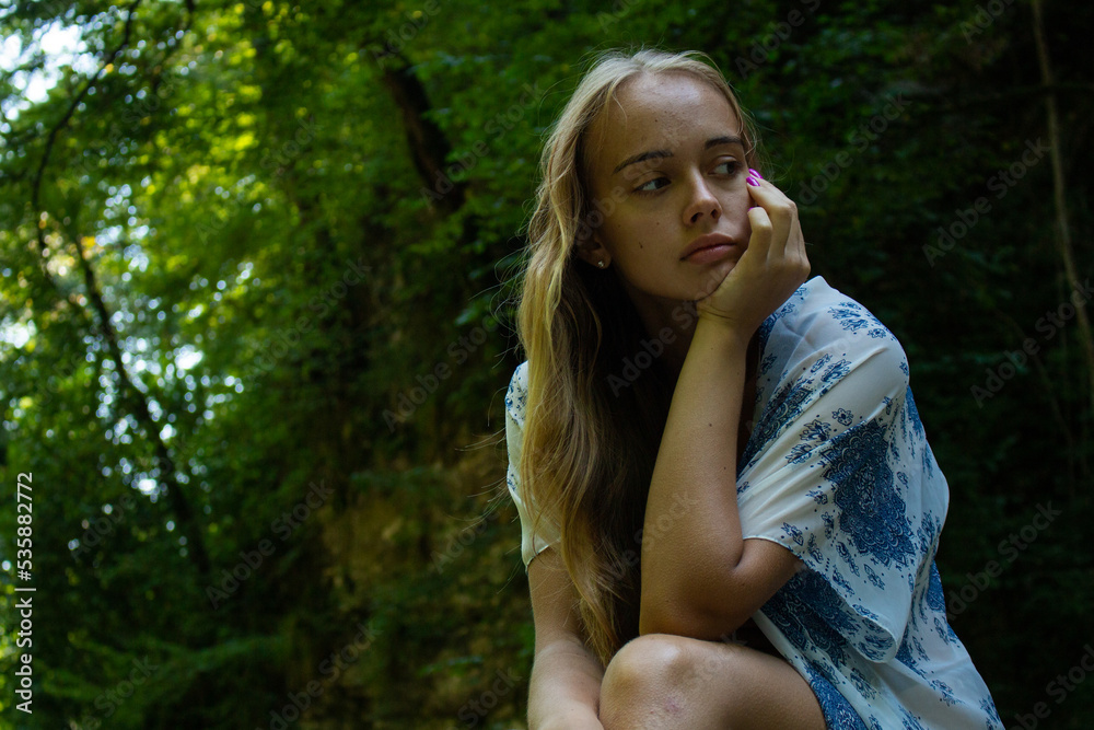 beautiful blonde in a swimsuit walks in the mountains beautiful blonde in a swimsuit walks in the mountains