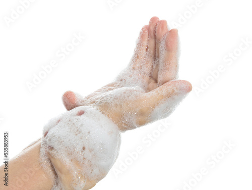 Woman rubbing wrist on white background