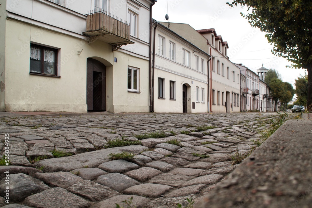 Paved stone cubes with a visible gutter, Podrzeczna Street, in Łowicz, Poland.