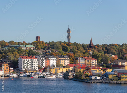 Harbor view and towers on the museum island Djurgården a colorful sunny autumn day in Stockholm