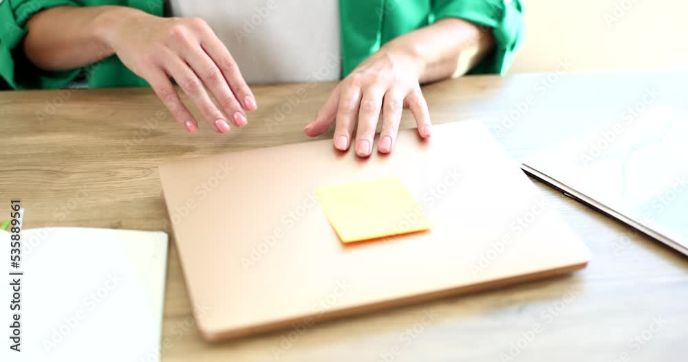 Female marketer closes laptop and takes analytical statistics Female marketer closes laptop and takes analytical statistics