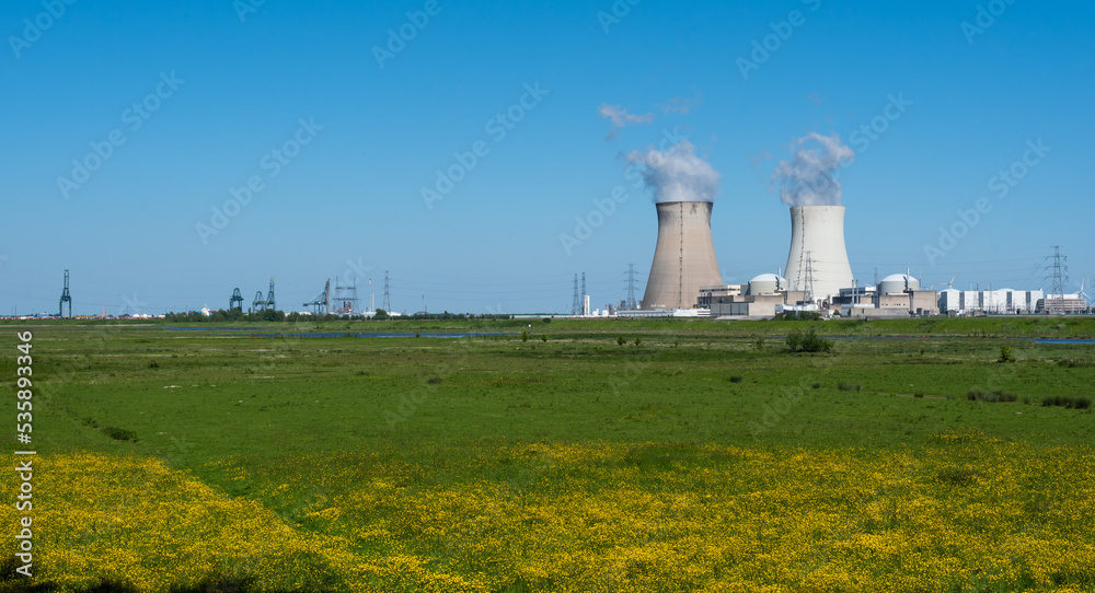 Doel, East - Flanders - Belgium -  Cooling towers of the nuclear power reactors with agricultural fields in the foreground