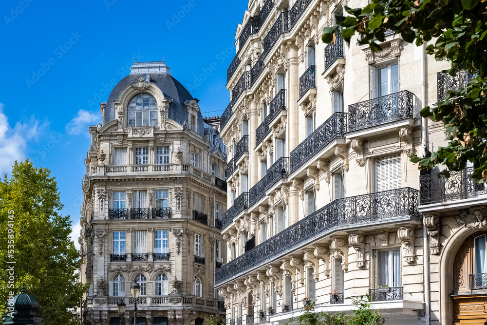 Paris, beautiful building in a luxury neighborhood, typical Haussmann facades
