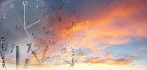 Fototapeta Naklejka Na Ścianę i Meble -  Clocks and calendars in sky