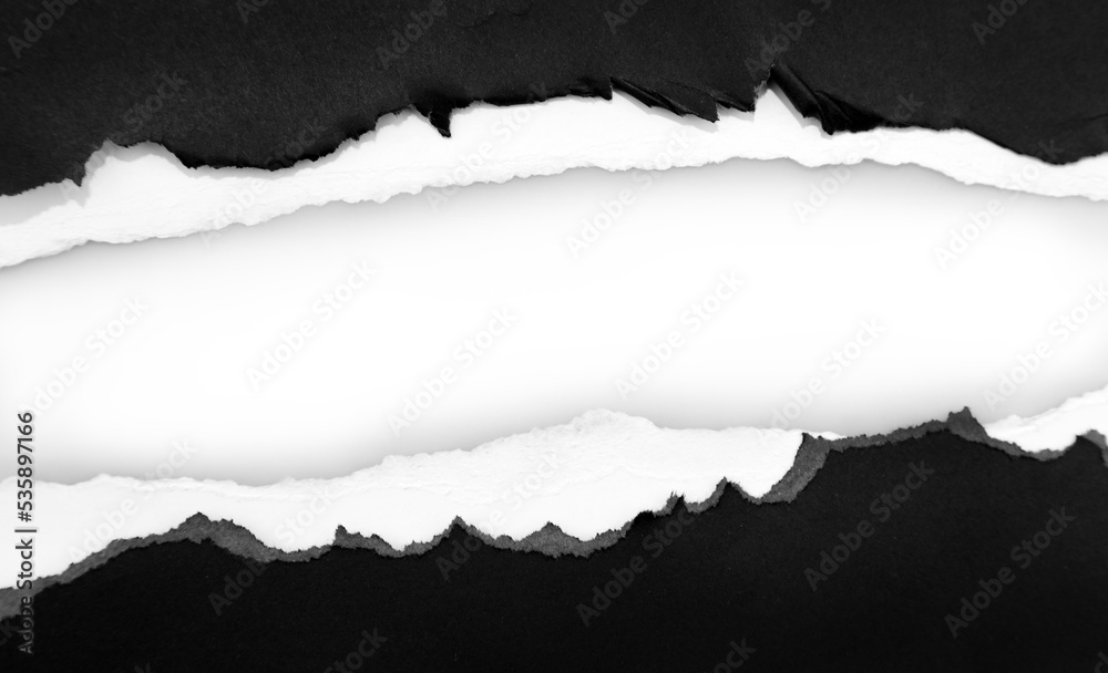 Gap in ripped black paper on white Gap in ripped black paper on white