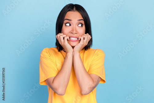 Fotografie, Obraz Photo of horrified scared cute woman with bob hairstyle wear yellow t-shirt look