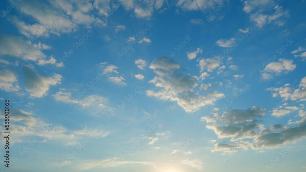 Beautiful cloud space weather. Twilight evening time. Burning sky and shining, orange white. Time lapse.