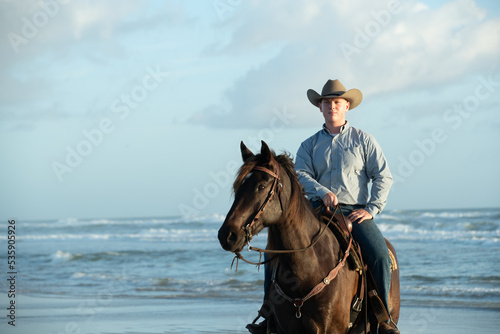 Riding horses on the beach