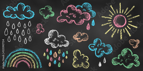 Set of Design Elements Rainbow, Sun, Clouds, Drops of Different Colors Isolated on Chalkboard Backdrop. Realistic Chalk Drawn Sketch of Sky Symbols.