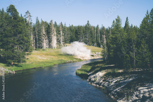 Yellowstone River, as Riverside Geyser erupts