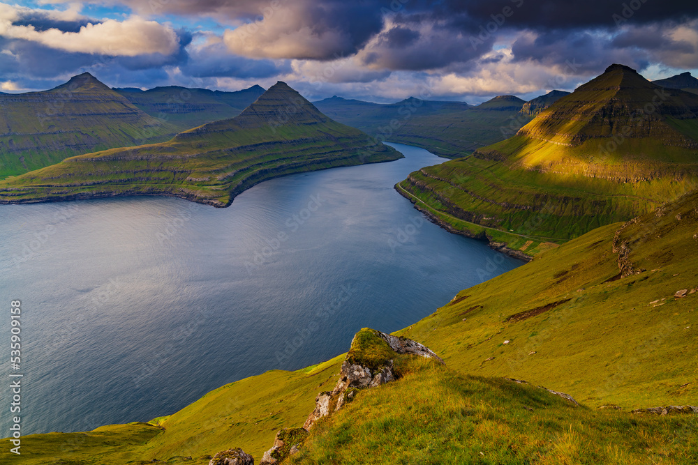 Standing on the Hvíthamar mountain ridge, you have a panoramic view of the Funningur fjord.