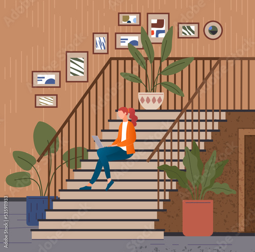 Woman using laptop in modern hallway. Girl sits on staircase and works on computer. Lady spends time with technology in corridor or hall of building. Female character working with laptop on stairs
