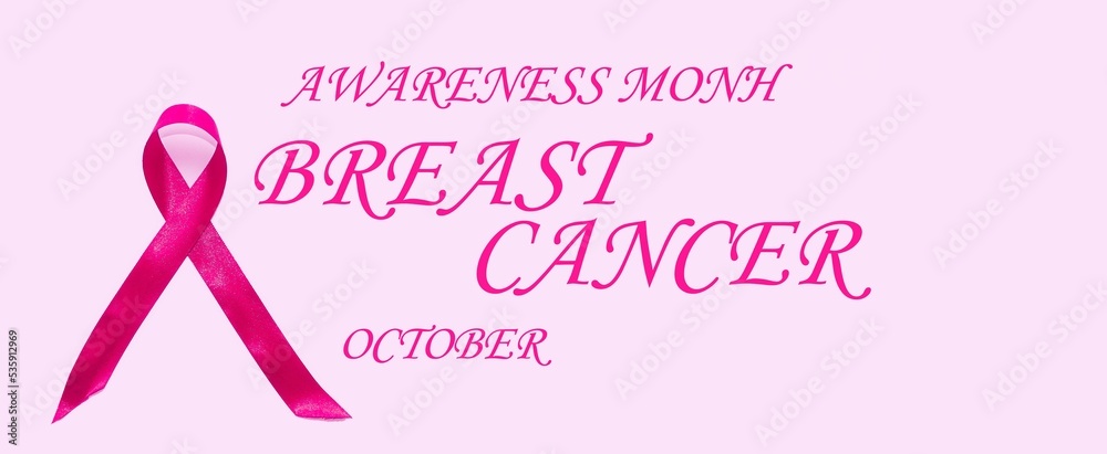On a pink background, the emblem is a satin pink ribbon.  Breast cancer notice poster.  The concept of healthcare and medicine.  Close-up.