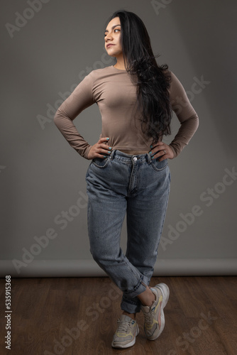 full body of young woman wearing casual clothes with jeans, youth beauty and fashion, modeling person with long hair