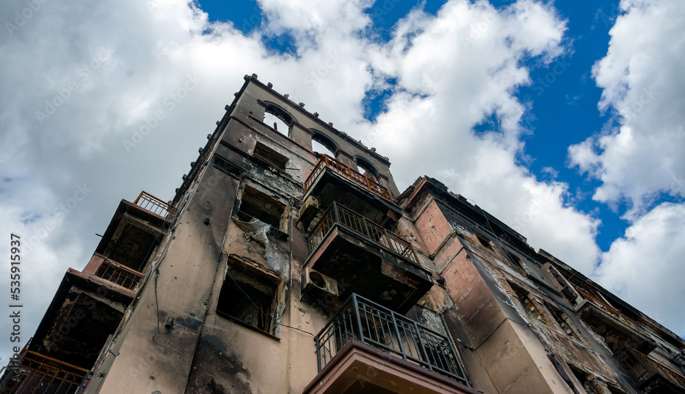 destroyed and burned houses in the city during the war in Ukraine