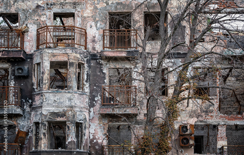 destroyed and burned houses in the city during the war in Ukraine