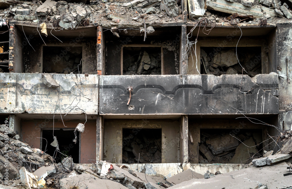 destroyed and burned houses in the city during the war in Ukraine