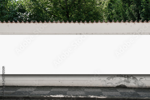 Long isolated on white hoarding is on urban street outside. Mockup space for advertise information.