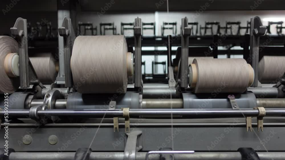 Yarn and Fabric Textile Factory. Manufacture Industrial Textile. Textile Machine Yarn Factory. Business Concept Yarn and Fabric Textile Factory. Manufacture Industrial Textile. Textile Machine Yarn Factory. Business Concept