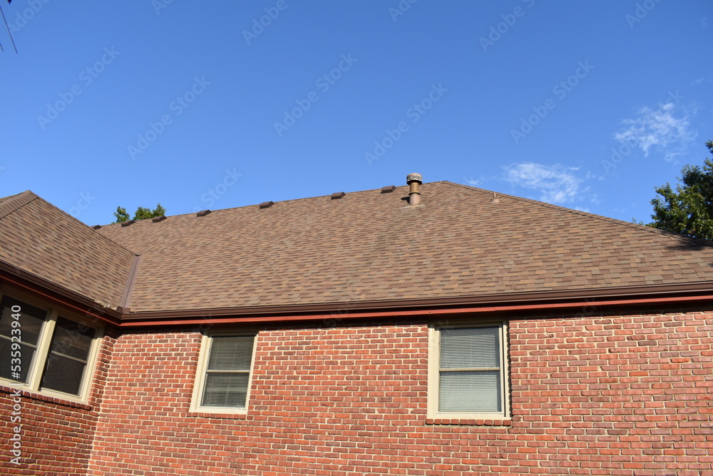 Brick House with Brown Shingles