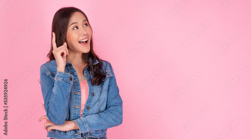 Positive Asian woman think choice creative on pink background. Smile girl thinking about question, pensive expression something over isolated. Lady thoughtful doubt holding finger on head looking up. Positive Asian woman think choice creative on pink background. Smile girl thinking about question, pensive expression something over isolated. Lady thoughtful doubt holding finger on head looking up.
