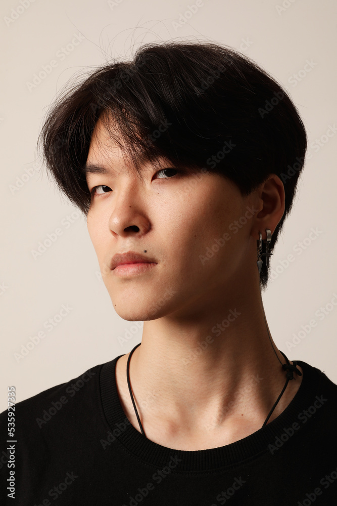 Portrait of confident young asian man posing indoor. Mental health issues. Portrait of confident young asian man posing indoor. Mental health issues.