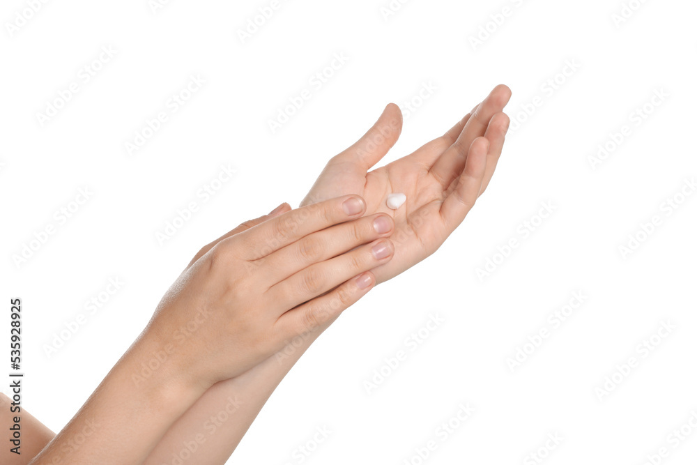 Woman applying cream on hand against white background, closeup Woman applying cream on hand against white background, closeup