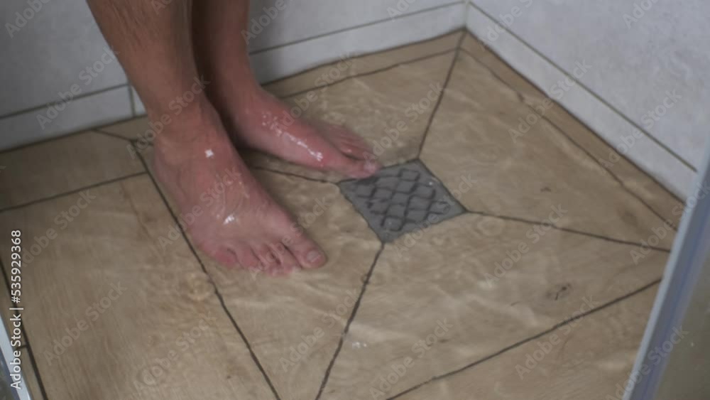 Vidéo Stock Water drain is clogged with hair. while taking a