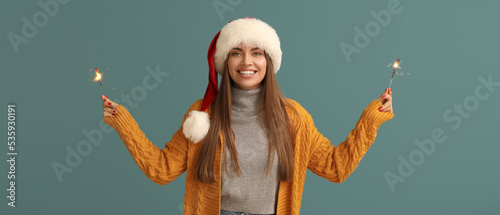 Pretty young woman in Santa...
