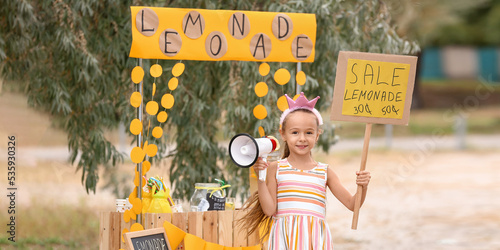 Cute girl with megaphone se...