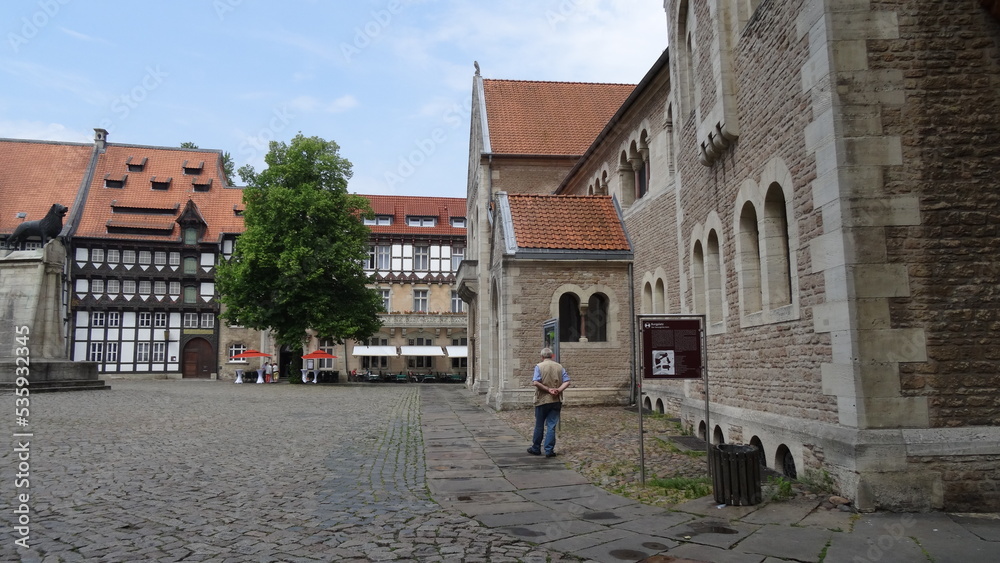 People, statue, lion, trees, buildings, at braunschweig, germany