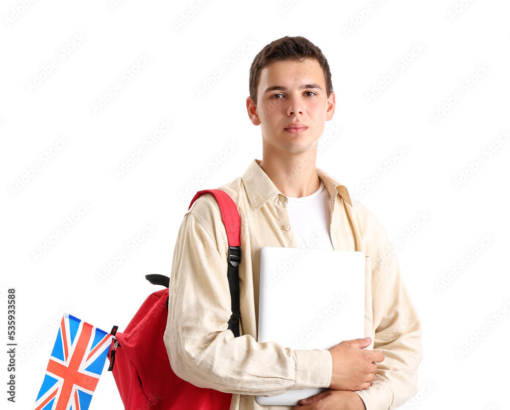 Teenage boy with UK flag, backpack and laptop on white background Teenage boy with UK flag, backpack and laptop on white background