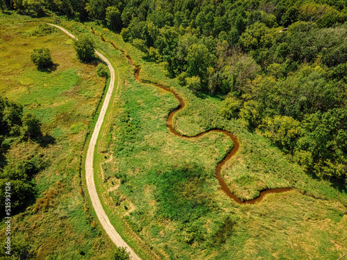 Aerial over wisconsin summer walking trail