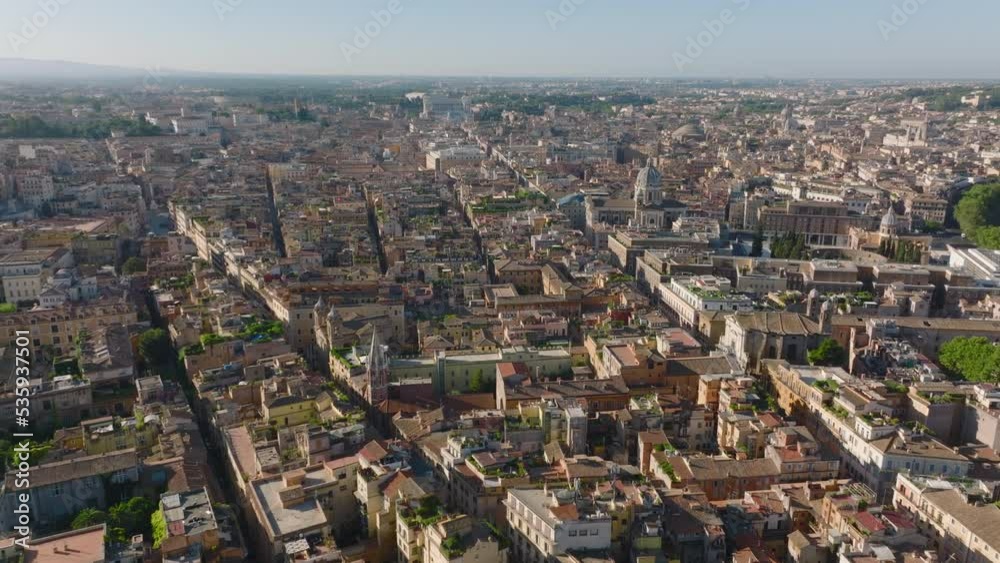 Backwards fly above old town, narrow streets and historic buildings in city. Revealing Terrazzo del Pinkie with views on landmarks. Rome, Italy Backwards fly above old town, narrow streets and historic buildings in city. Revealing Terrazzo del Pinkie with views on landmarks. Rome, Italy